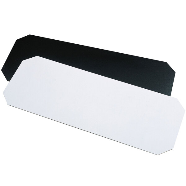 a black rectangular object on a white surface