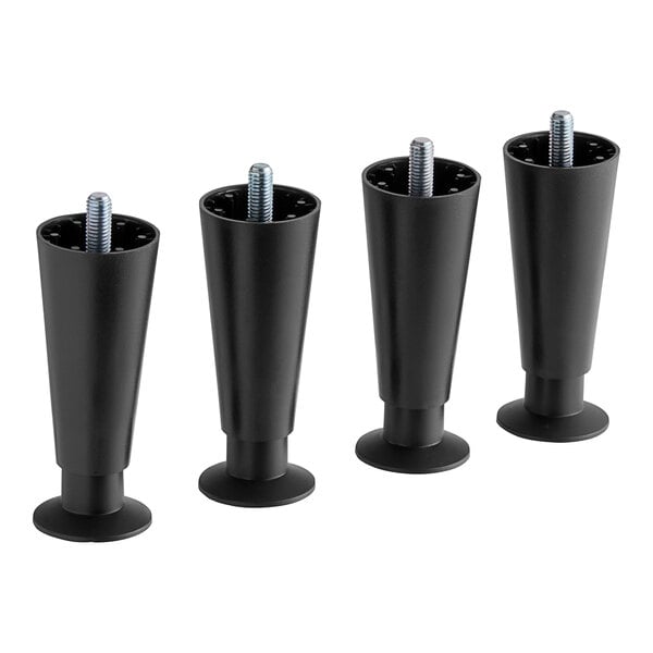 A set of four black plastic Ice-O-Matic legs.