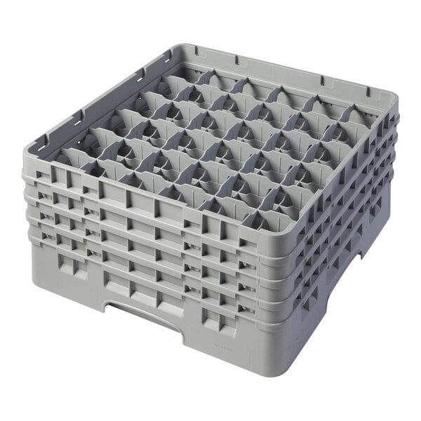 A grey plastic container with compartments and holes.