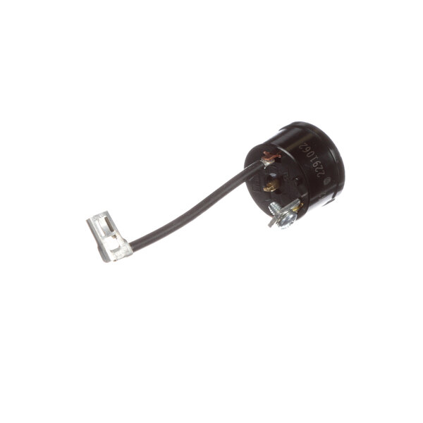 A black round True Refrigeration overload device with wire connections.