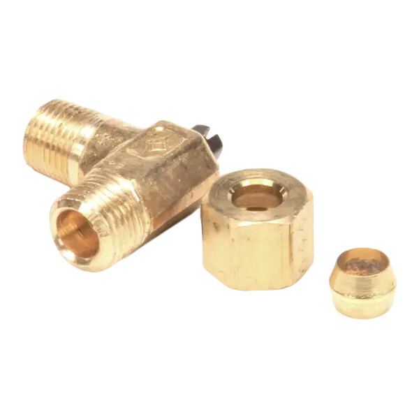 A brass valve assembly with threaded fittings and two additional brass components.