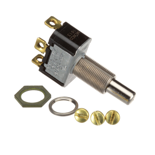 A close-up of a Kolpak round push button switch with a brass ring.