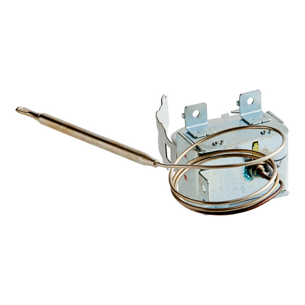 A Vulcan Hi Limit Switch, a metal thermostat with a wire attached to it.