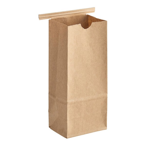 A brown paper bag with a white background.