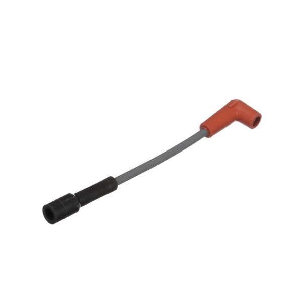 A long grey and orange ignition cable with a red and black connector on one end.