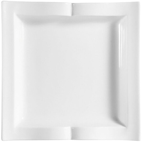 A CAC Goldbook Bone White square china plate with a corner cut out.