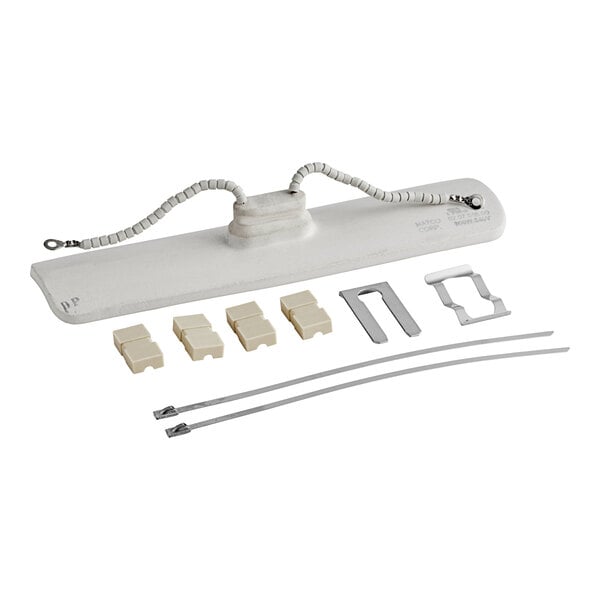 A white rectangular object with wires and a white plastic cable handle.