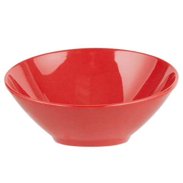A red bowl with a speckled surface.