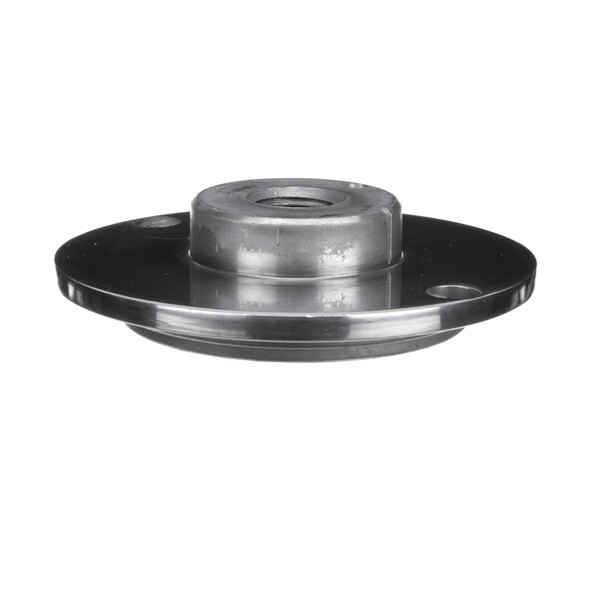 A black metal Grindmaster-Cecilware cap with a hole in the center and a nut.