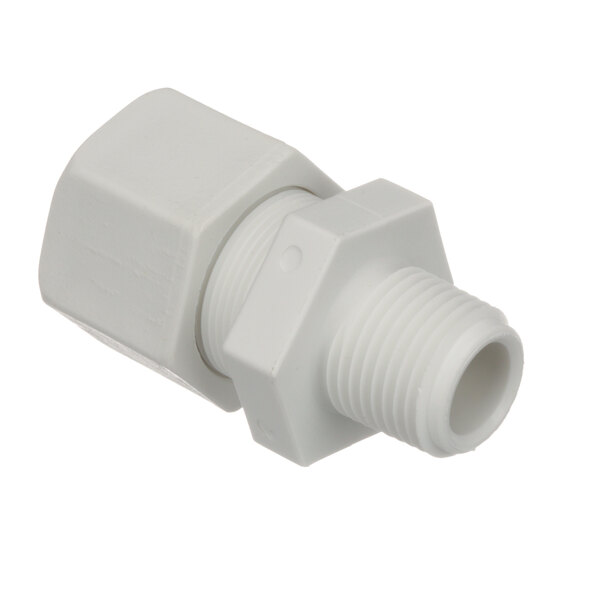 A close-up of a white plastic pipe fitting.