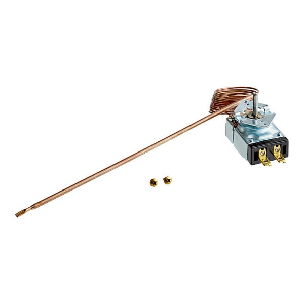 A Vulcan thermostat with a copper wire and brass knob.