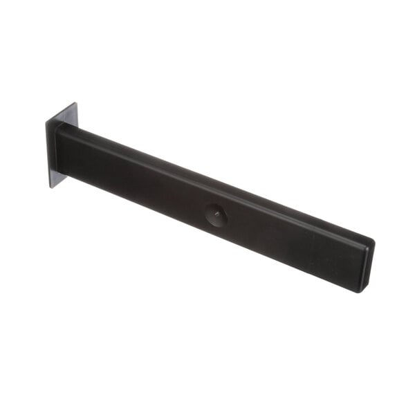 A black metal rectangular drip pan with a round hole in it and a handle.