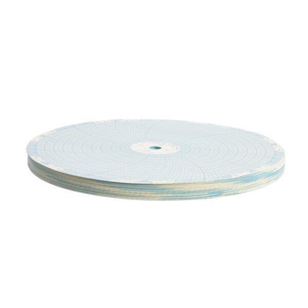 A stack of blue and white Norlake chart paper with a circle in the center.