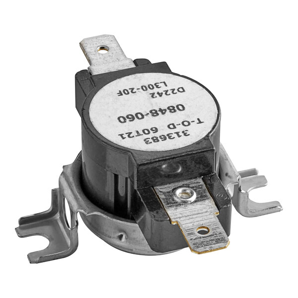 A close-up of a black and white metal switch with metal corners.