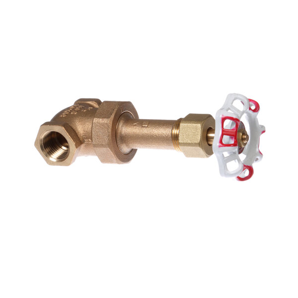 A close-up of a brass Groen gate valve with a red handle.