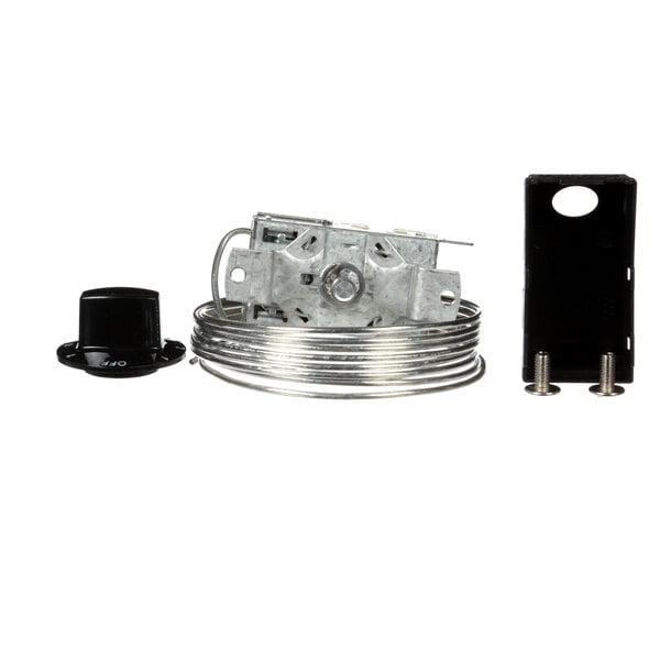 A black rectangular Low Temp Industries thermostat with a white border and metal cover.