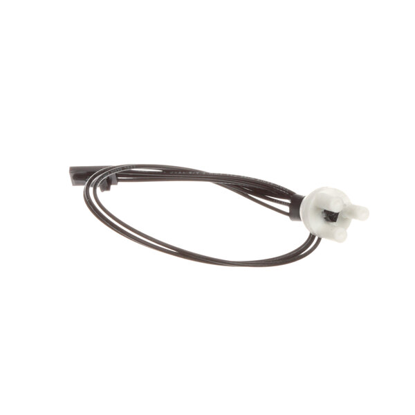 A close-up of a black and white cable with a white plug.