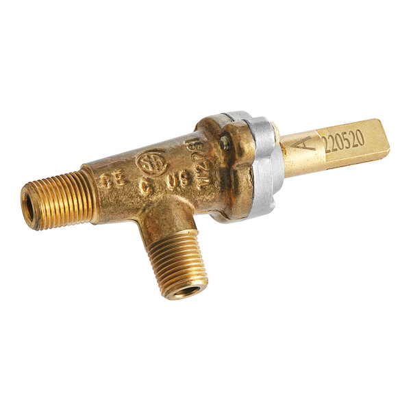 A close up of a brass and silver Vollrath gas valve with a gold handle.