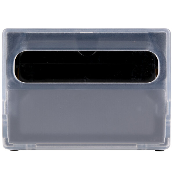 A clear plastic case with a black rectangular object inside.