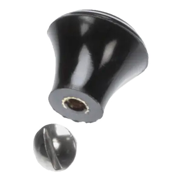 A black circular knob with a metal ball on top and a hole in the center.