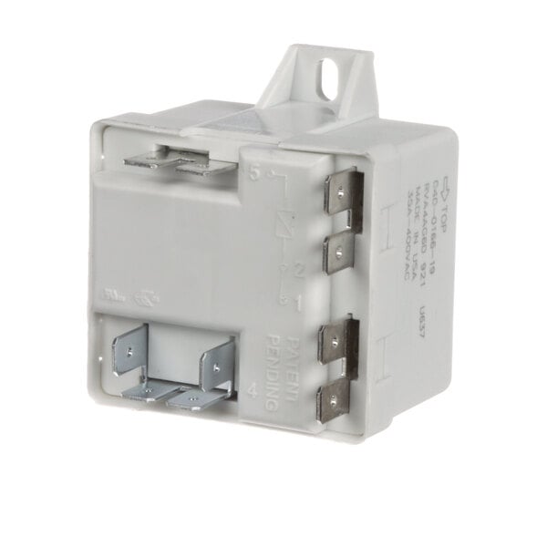 A white Master-Bilt compressor relay with metal terminals.