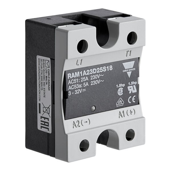 A black and white electrical device with a small circuit breaker inside.