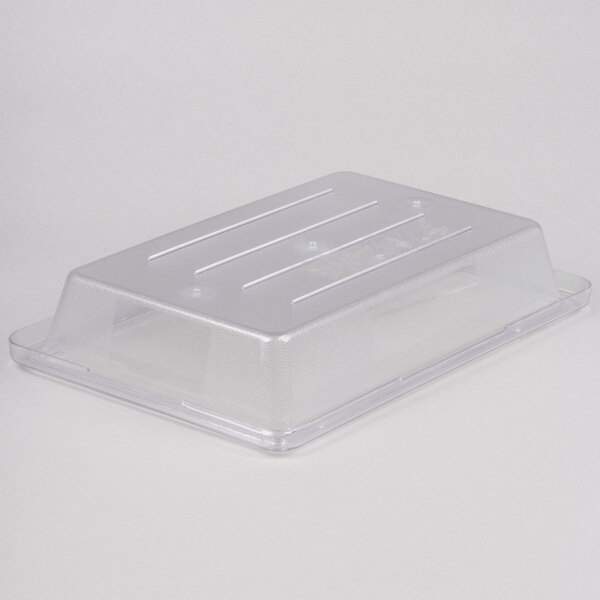 A clear Rubbermaid polycarbonate food storage container with a lid.