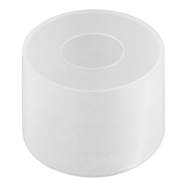 A white plastic cap plug with a circle in the middle.