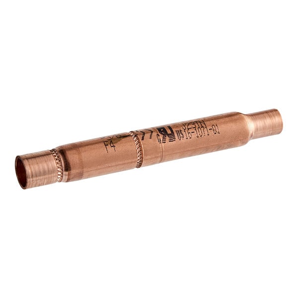 A close-up of an Ice-O-Matic check valve on a copper tube.