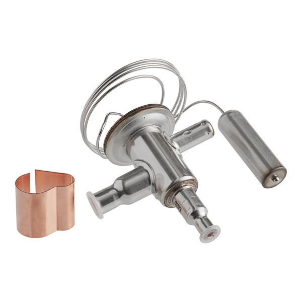 A Manitowoc Ice expansion valve with a copper pipe and copper ring.