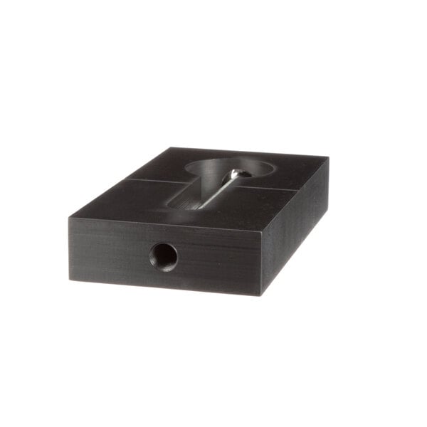 A black rectangular Univex pin replacement tool with a hole in it.