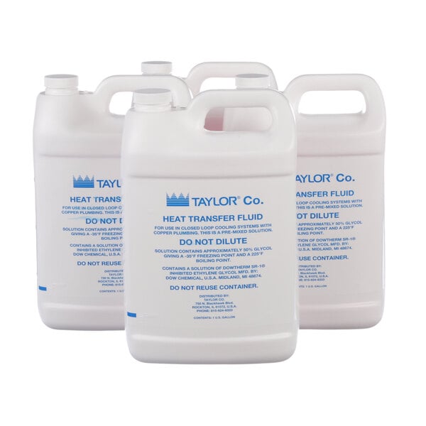 A group of white plastic Taylor containers with blue text containing heat treatment fluid.