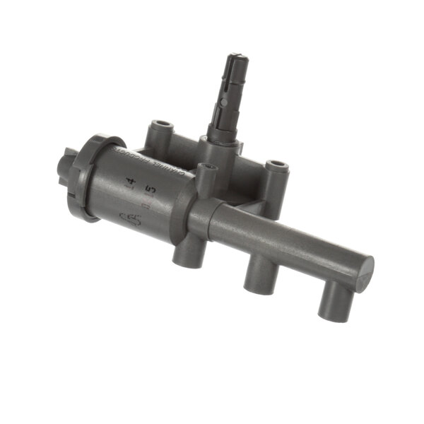 A grey plastic ignitor with a small hole at the end.