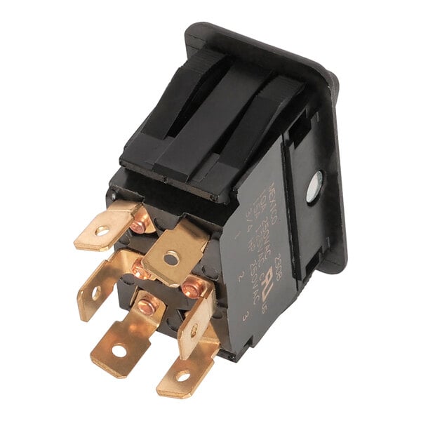 A black Imperial electrical switch with gold metal parts.