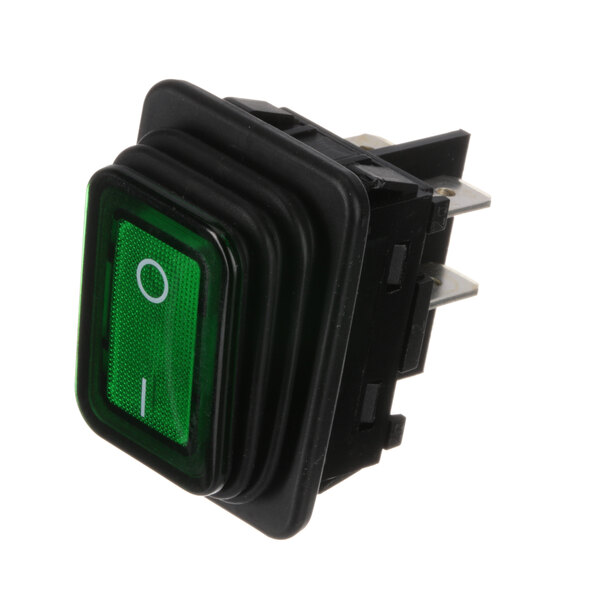 A close-up of a green Cadco rocker switch with white text on it.