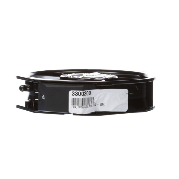 A black round fan motor base with a white label on it.