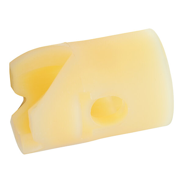 A yellow Traulsen plastic hinge bushing with a hole in it.