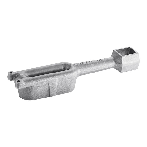 A silver metal Frymaster burner with a square object on the end.