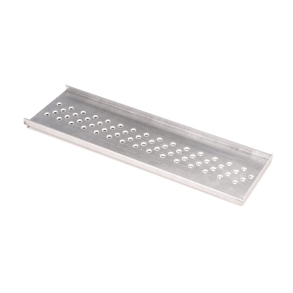 A Middleby Marshall metal plate with holes.