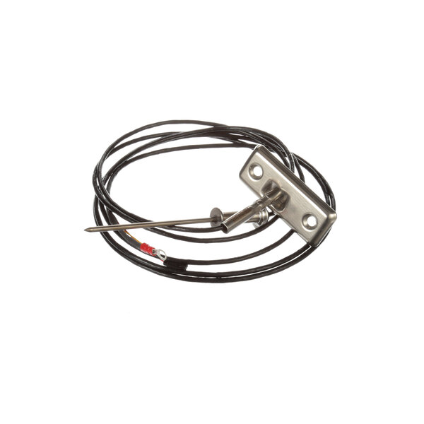 A black cable with a red connector and a metal object on a black wire.
