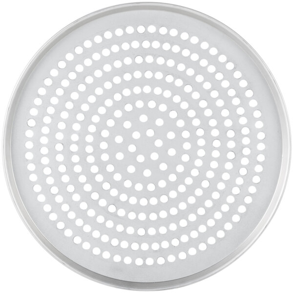 A white circular metal pizza pan with perforations.
