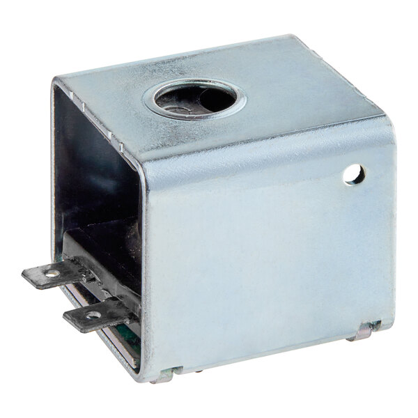 A small metal box with a hole in it.