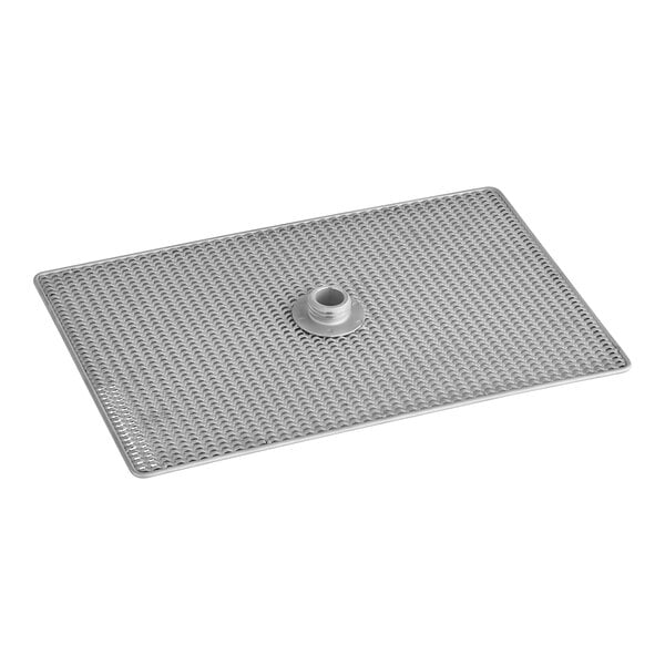 A metal grid with a hole in the middle.