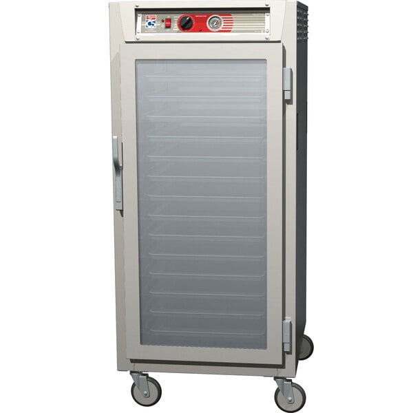 A white Metro C5 heated holding cabinet with a glass door.