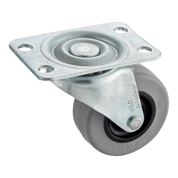 A Frymaster caster with a metal wheel and round metal plate.