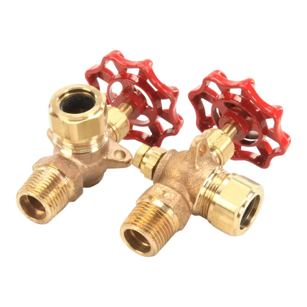 A pair of brass water gauge valves with red handwheels.