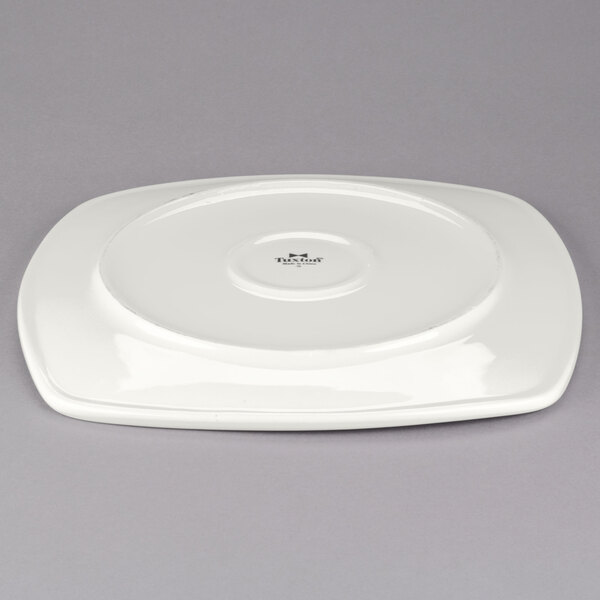 a white plate with a logo on it