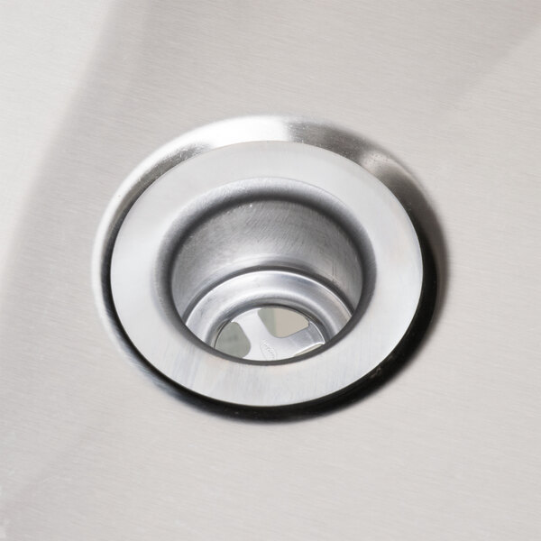 An Eagle Group underbar ice chest with a stainless steel sink drain.