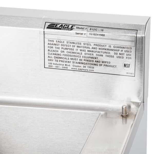 a label on a stainless steel surface