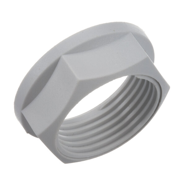 A white plastic nut with a grey ring and a hole in the middle.